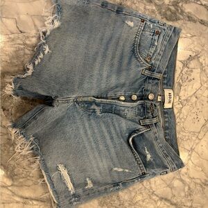 Women’s Agolde Parker long Jean shorts. Never worn! Size 27